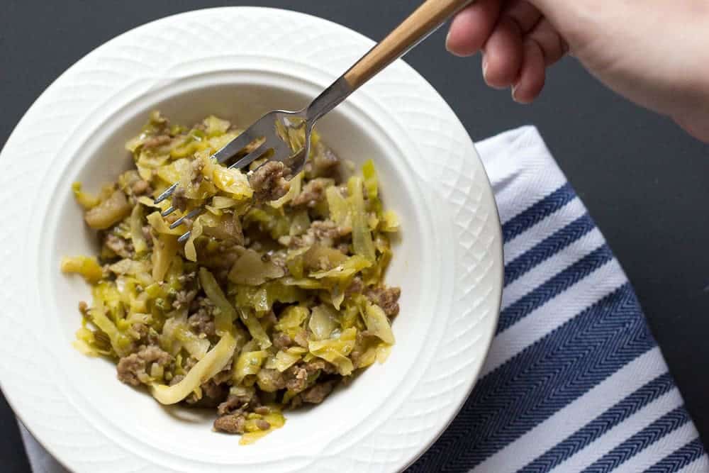 Quick pork and cabbage skillet meal.