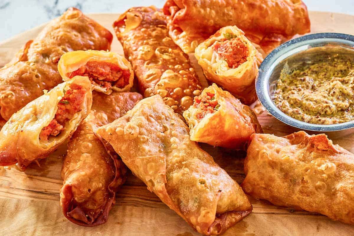 Crispy egg rolls stuffed with boudin sausage.