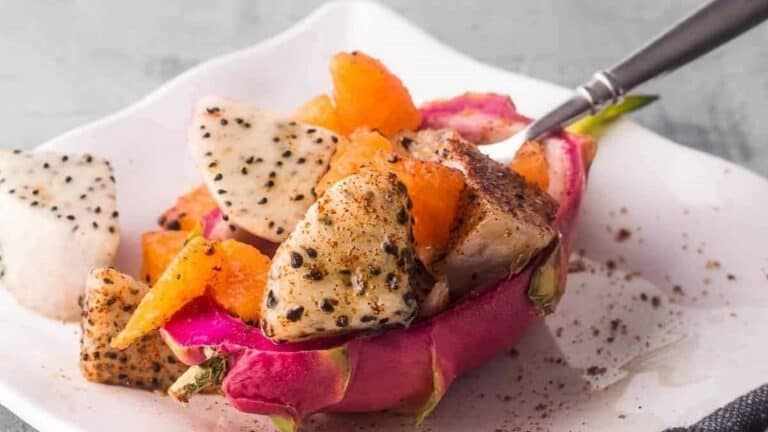 Dragon Fruit Salad on a white plate.