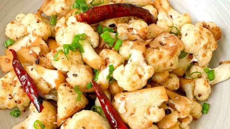 Stir fry cauliflower on a plate.
