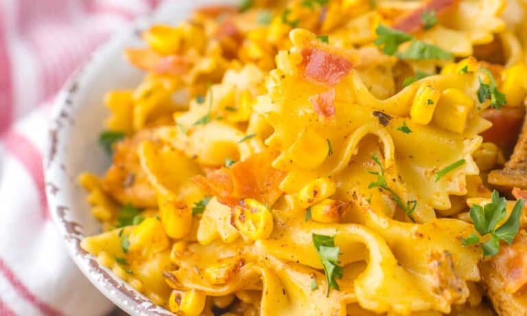 Creamy Chicken And Corn Pasta closeup partial of finished dish cropped horizontal.