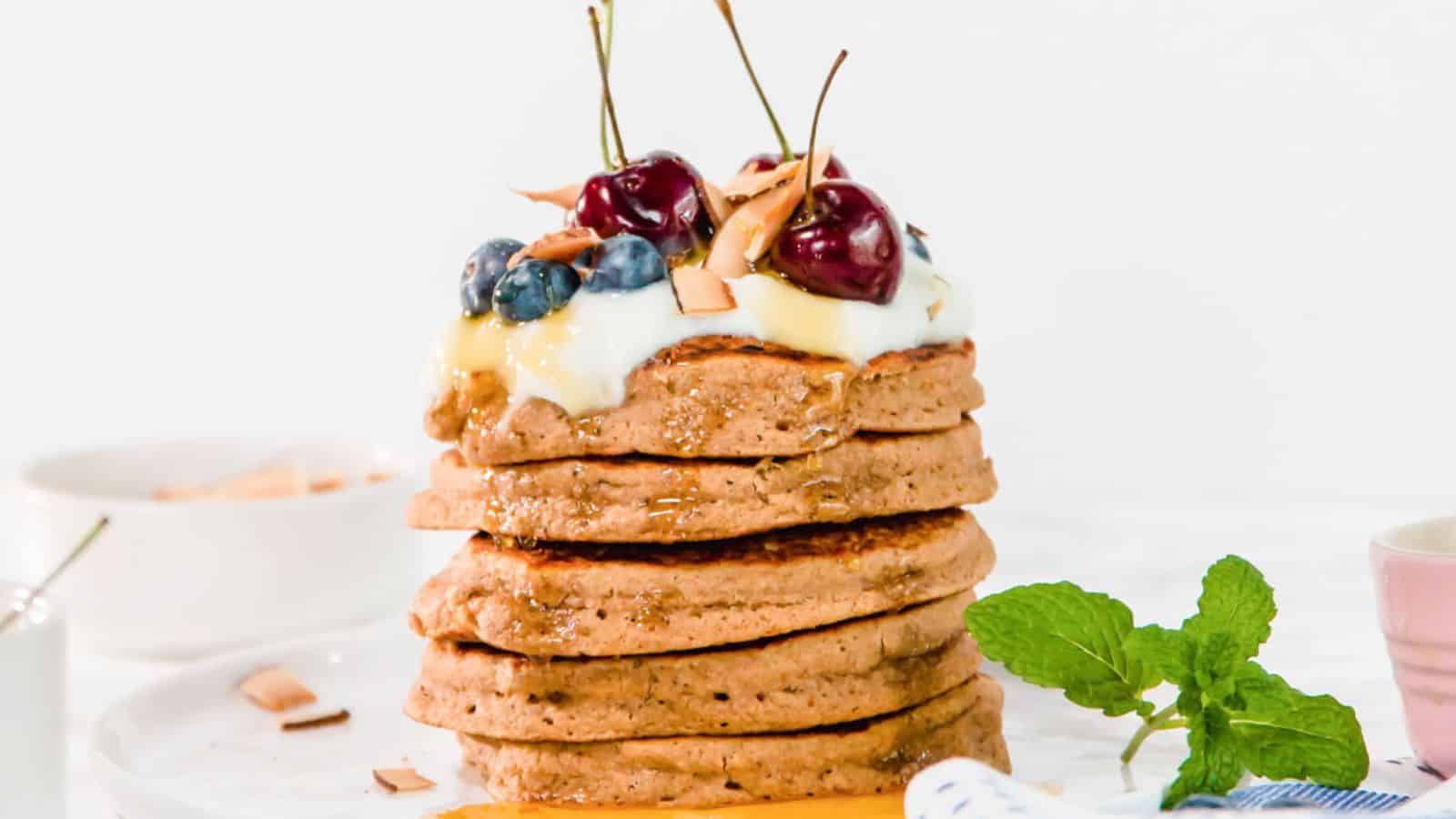 A stack of fluffy Vegan Oatmeal Pancakes.