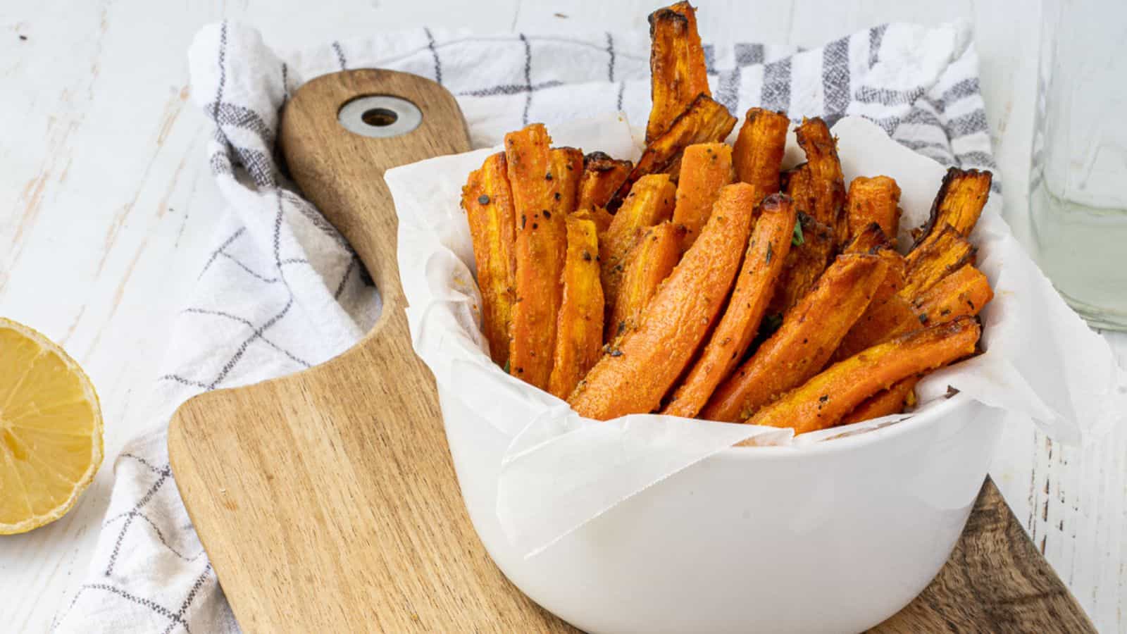 A bowl of crispy air fryer carrot fries.