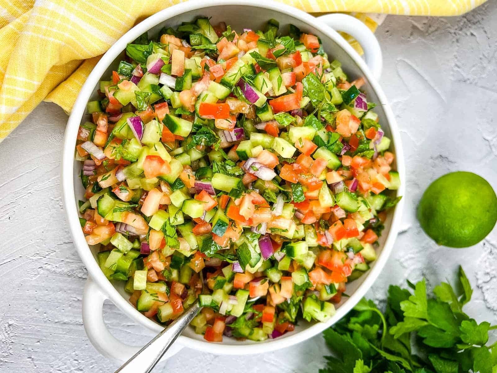 Shirazi Salad in a white serving bowl.
