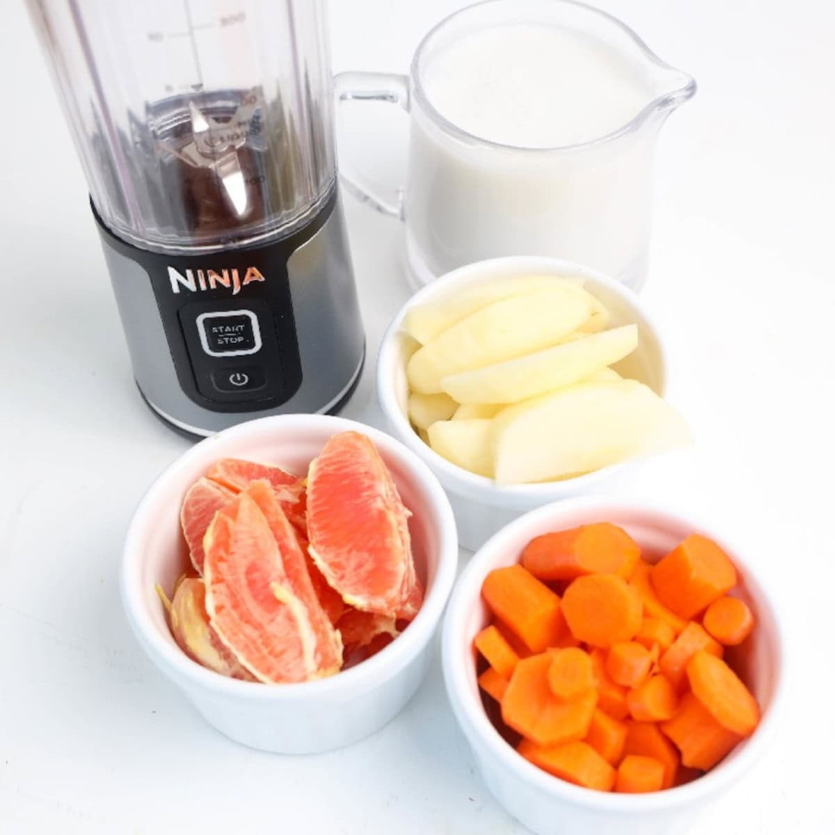 Ingredients for a smoothie in a blender.