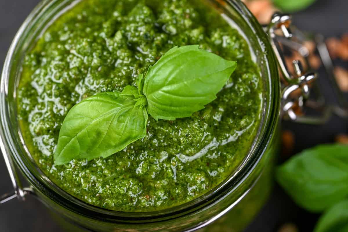Green vegan pesto in a jar.