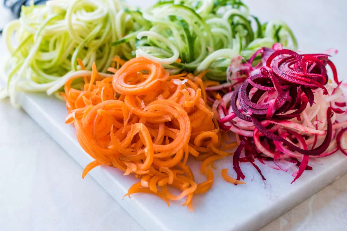 Veggie noodles on a white plate.