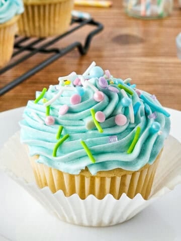 Gluten free cupcakes on a white plate.