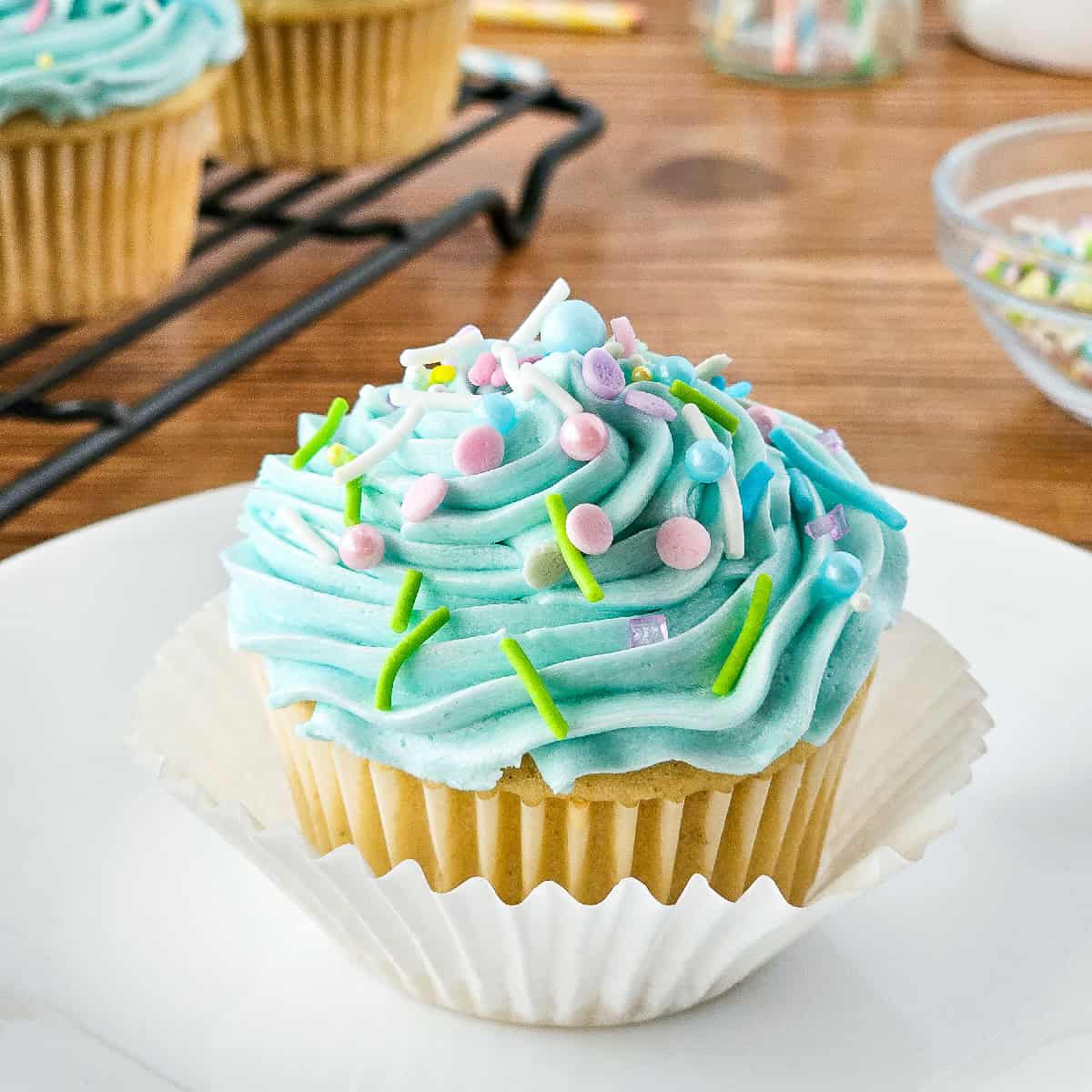 Gluten free cupcakes on a white plate.