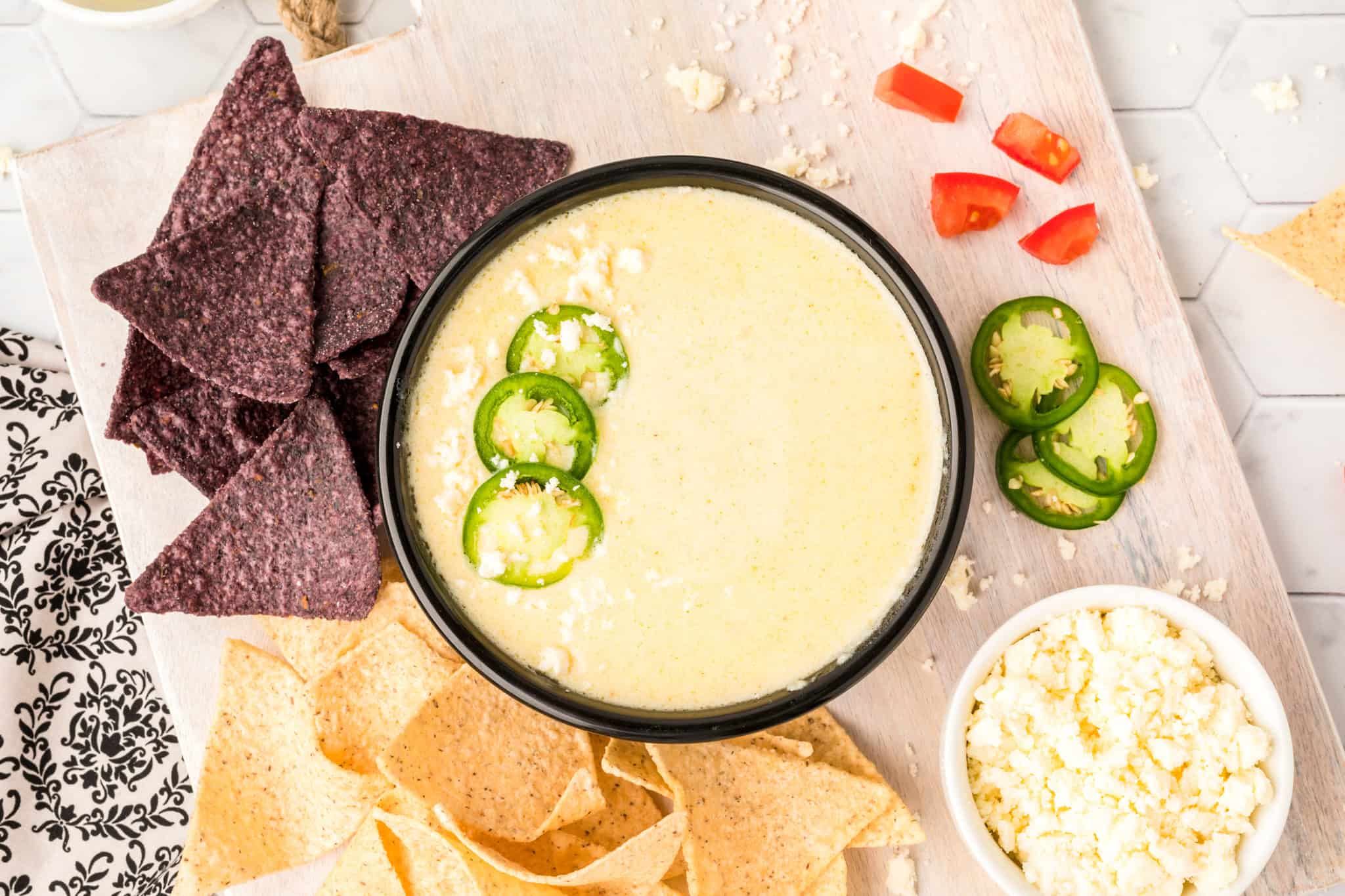 Velvety, cheesy white queso dip made with just five ingredients.