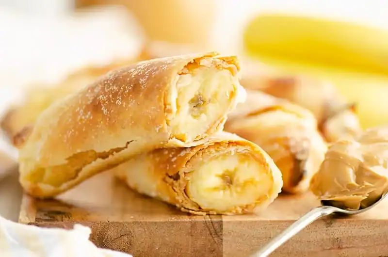 Crispy air-fried egg rolls stuffed with peanut butter and sweet banana slices.