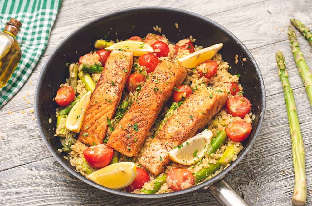 Pan-cooked salmon with lemon orzo pasta.