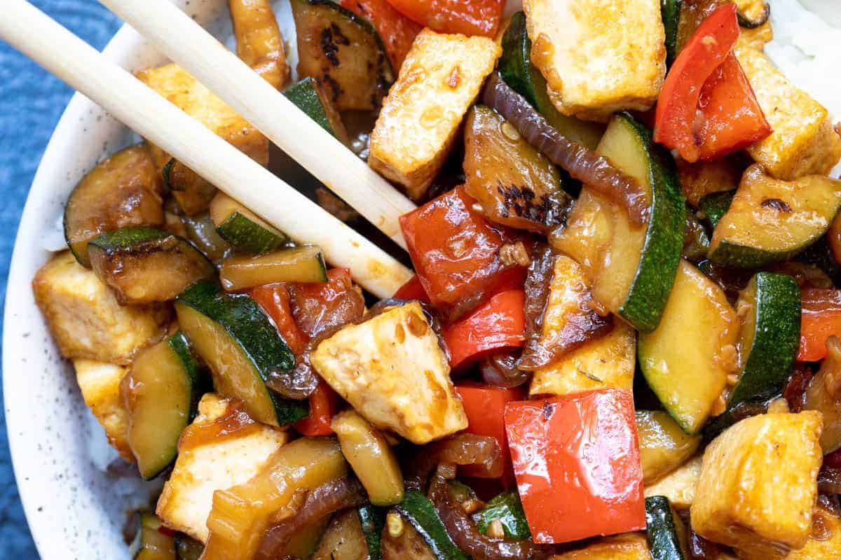 Zucchini stir-fry with tofu and colorful vegetables.