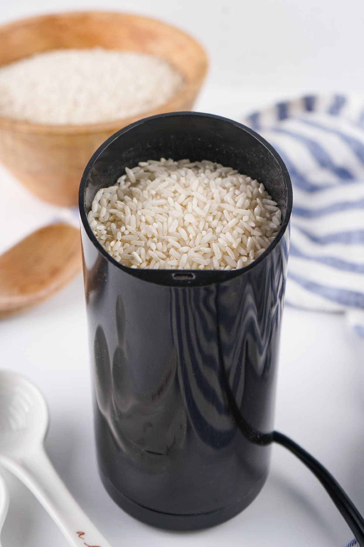 Grinder with rice in it.