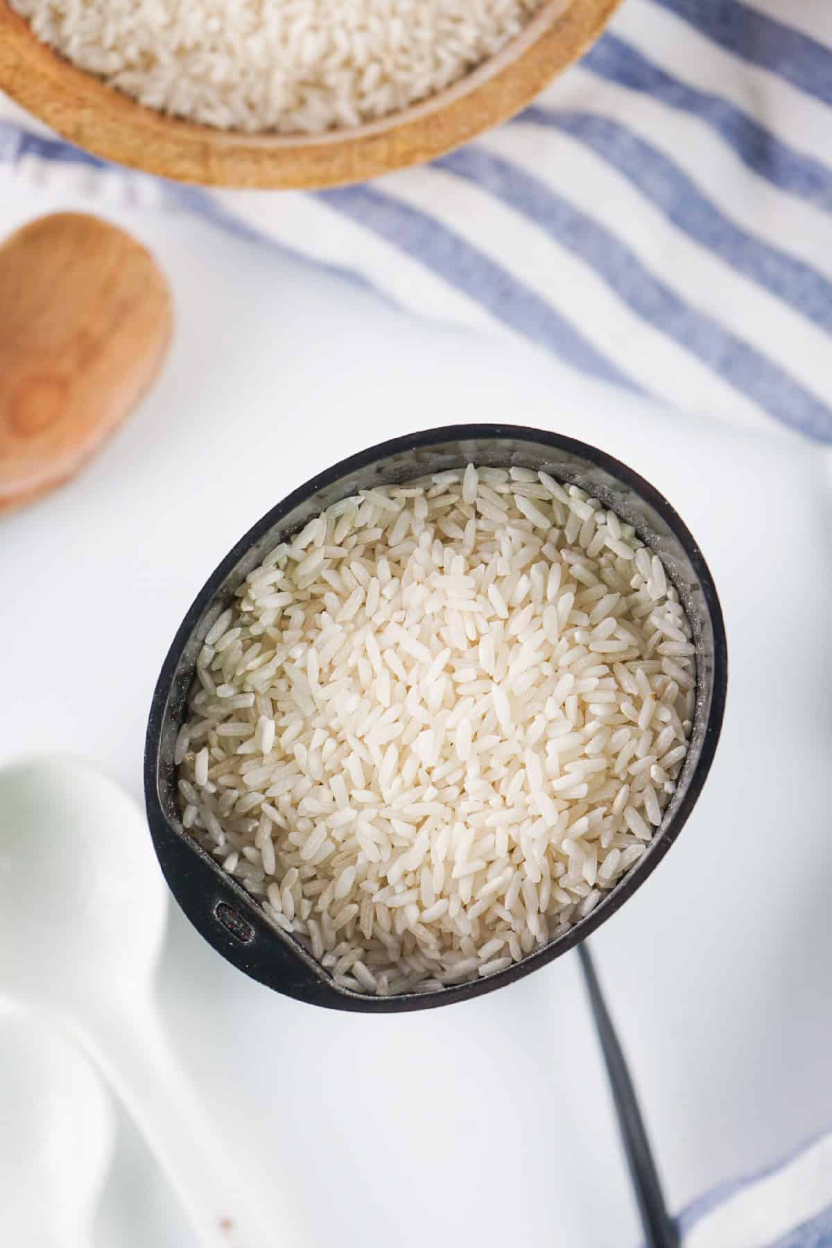 A grinder with rice in it.