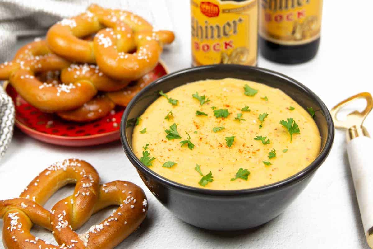 Rich, sharp cheddar and beer dip served warm for snacking.