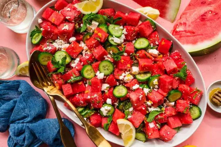 Watermelon_feta_cucumber-salad on a white plate.