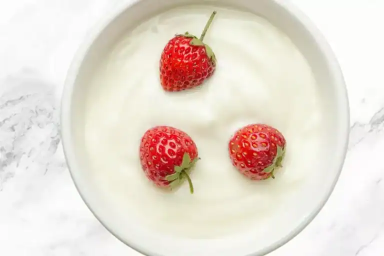 Thick homemade Greek yogurt in a bowl.