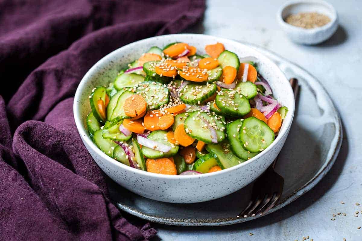 Spiralized cucumber and carrot in sesame dressing.