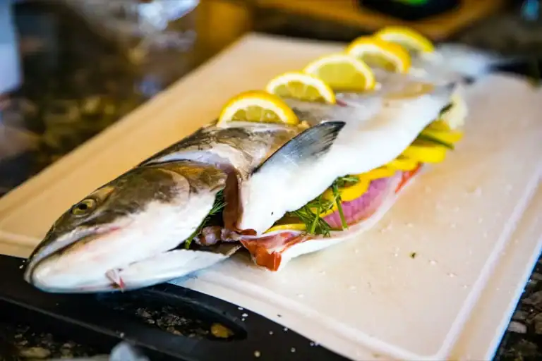 Grilled-Whole-Salmon on a white plate.