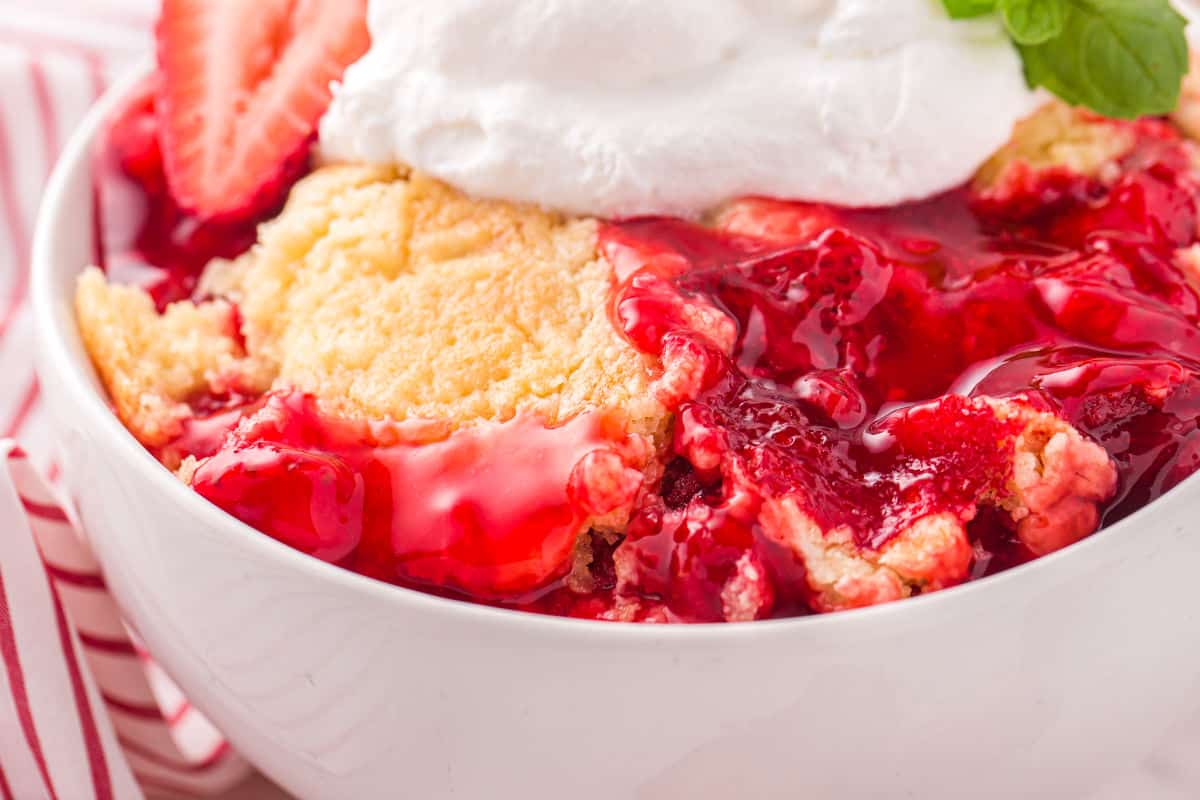 A fuss-free dessert made with cake mix, strawberries, and buttery topping.