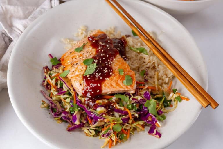 Teriyaki salmon bowl with rice and vegetables.