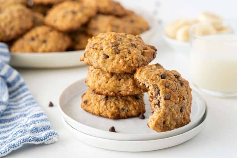 Close-up of homemade banana oatmeal cookies with golden-brown edges and oats visible