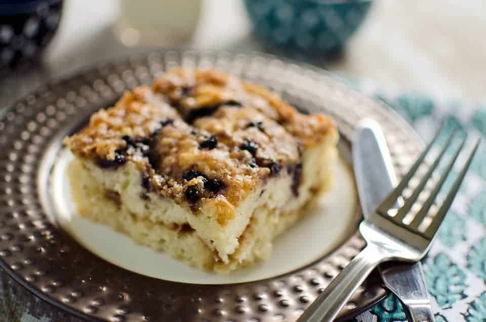 Rich coffee cake with blueberries and sour cream.