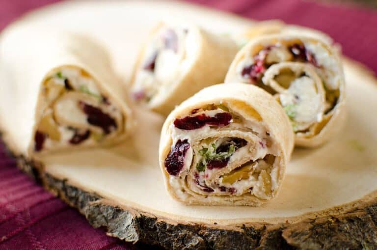 Festive pinwheels with creamy feta and cranberry filling.