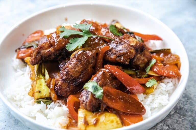Chicken wings in a spicy Thai red curry sauce.