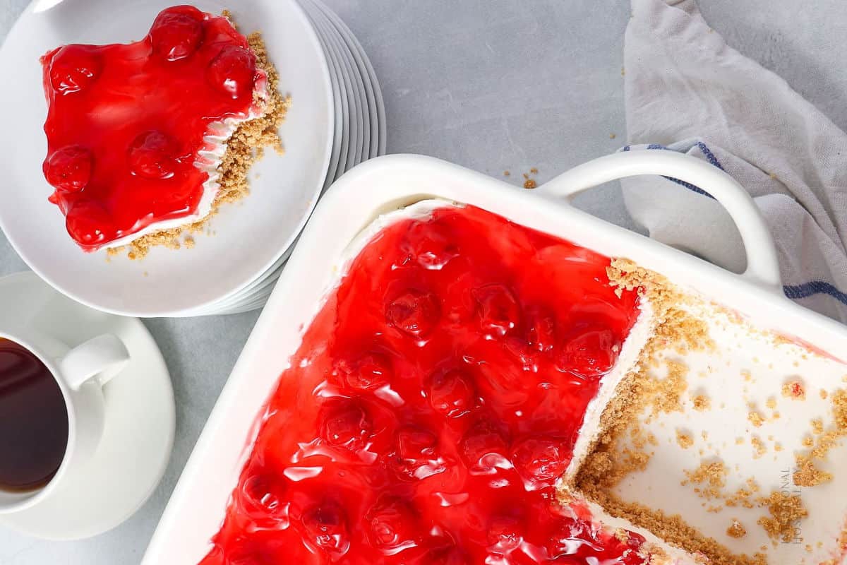 Creamy layered cherry dessert with graham cracker crust.