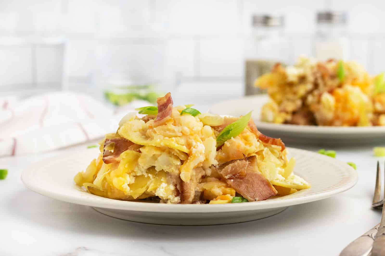Crockpot lazy pierogi casserole with cheesy layers.