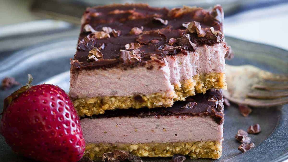 Creamy no-bake bars layered with fresh strawberries.