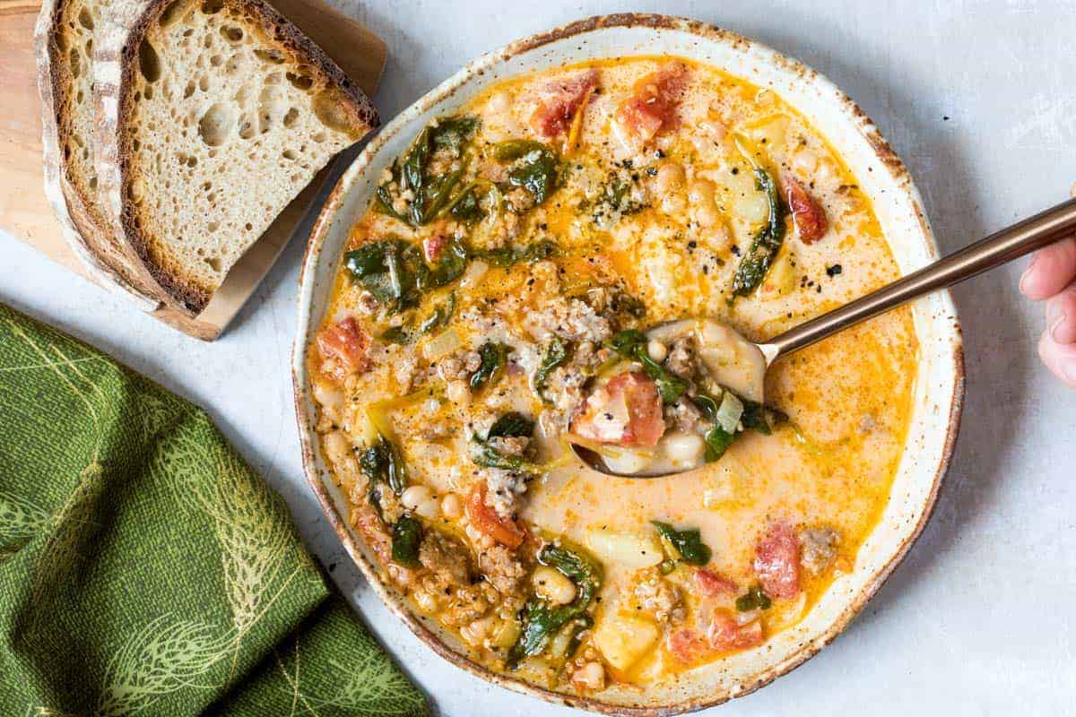 Creamy Tuscan white bean soup with spinach.
