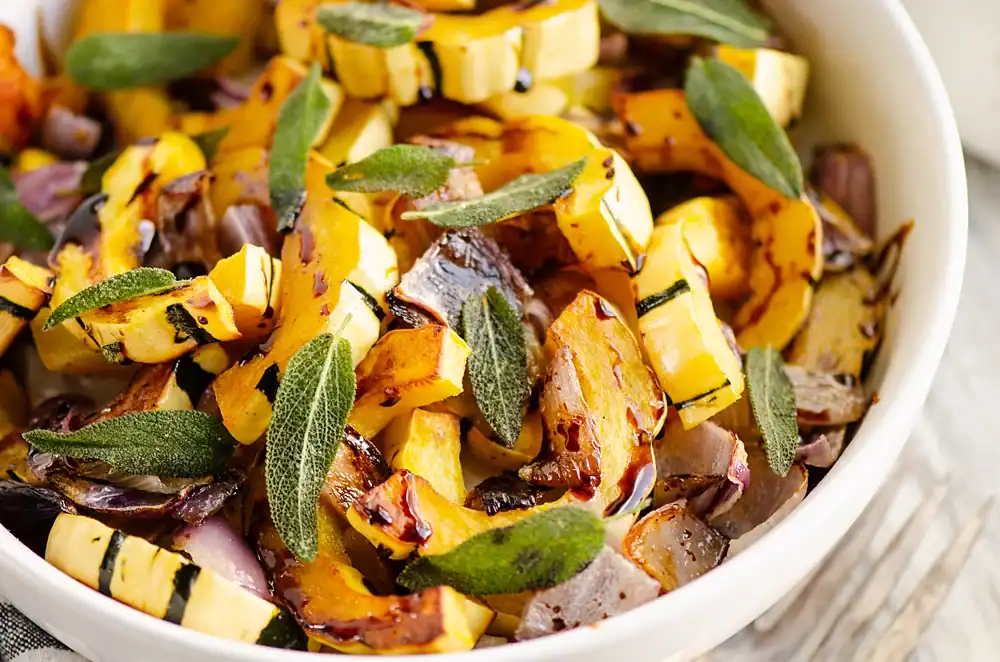 Delicata squash roasted with crispy sage leaves.