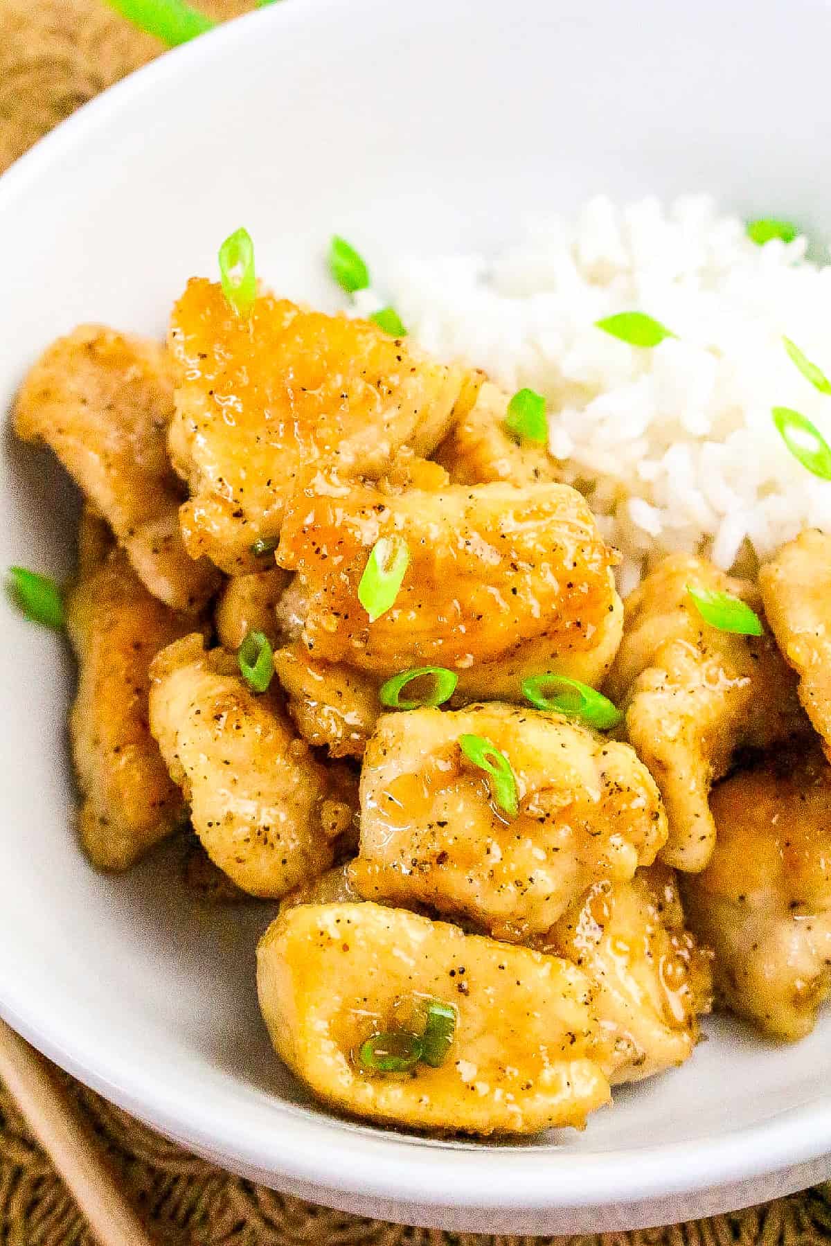 Tender honey butter chicken coated in garlic sauce, served over rice.