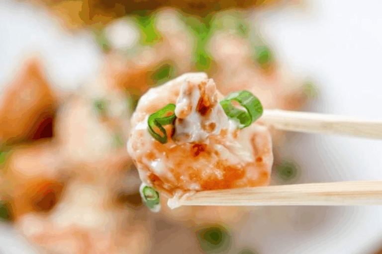 Crispy shrimp are coated in a creamy honey sauce and topped with candied walnuts. The dish is sweet, crunchy, and luxurious. A popular Chinese restaurant-style recipe you can recreate at home.