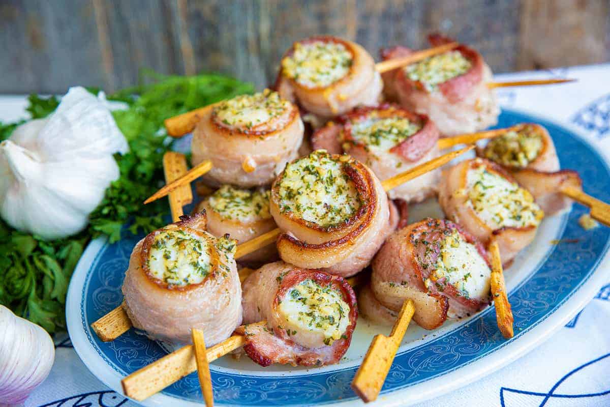 Scallops wrapped in crispy bacon.