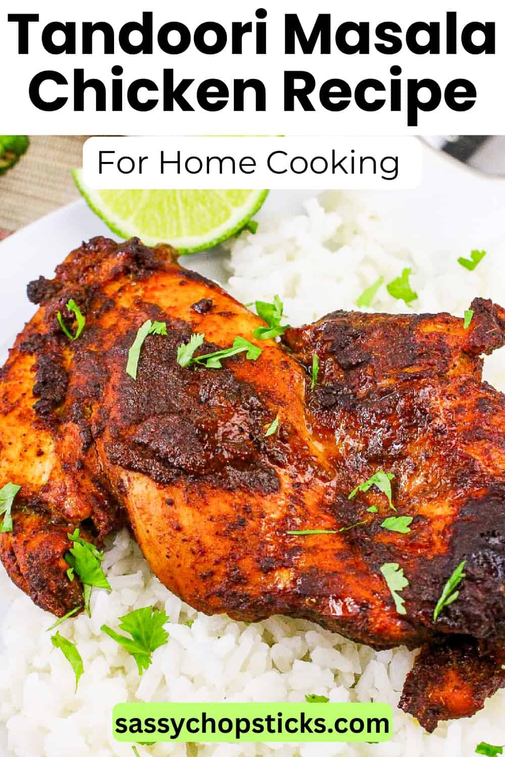 Close-up view of spiced tandoori masala chicken on white rice.