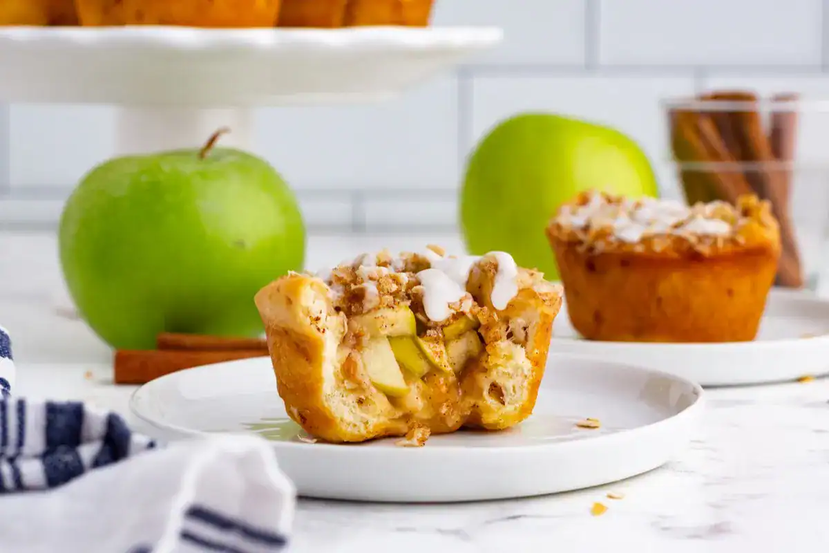 Apple crisp cinnamon roll cups baked on the Traeger.