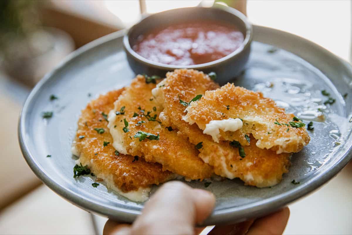 Blackstone fried mozzarella with crispy golden crust.