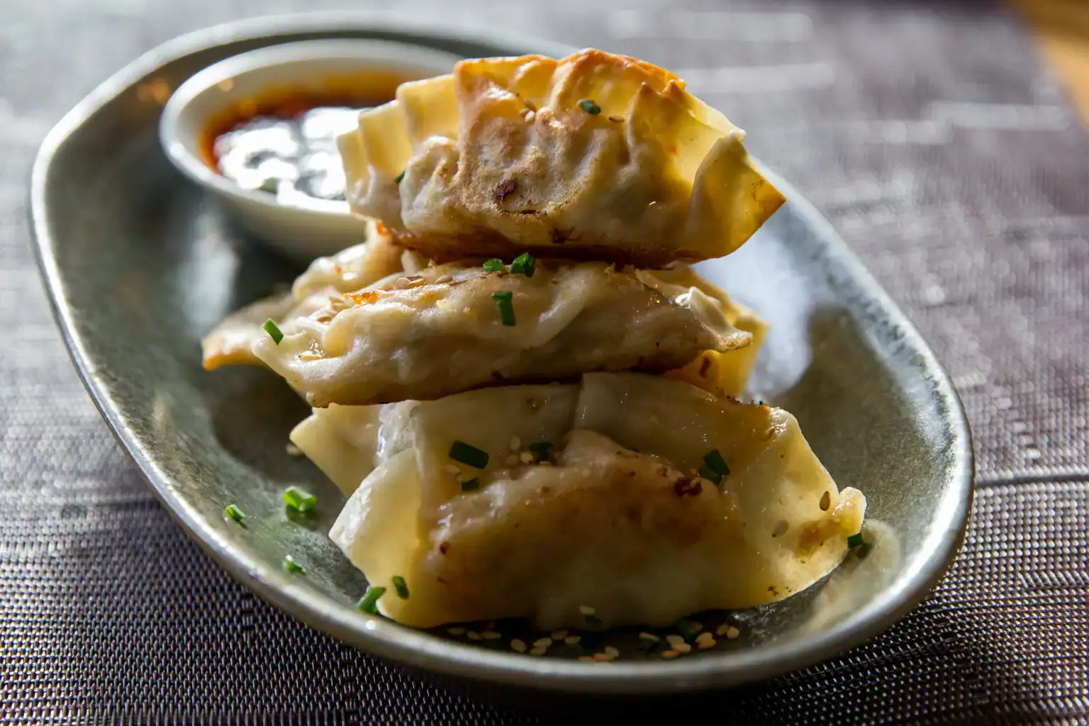 Blackstone grilled kimchi gyoza dumplings.