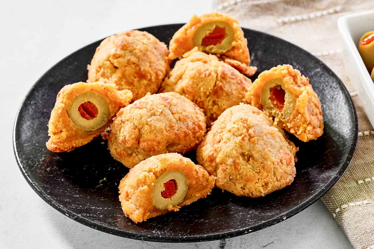 Golden baked olive cheese balls.