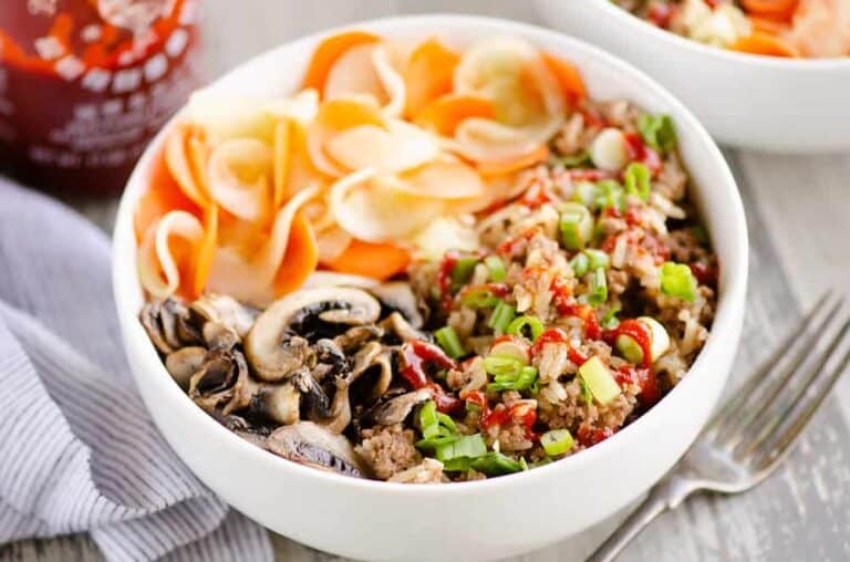 Tender Korean-style beef over rice cooked in a pressure cooker.
