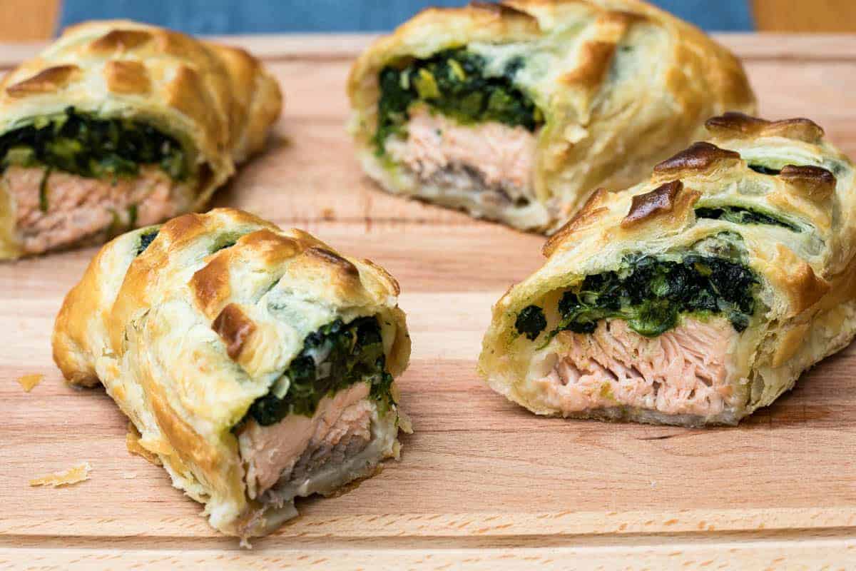 Puff pastry stuffed with spinach and salmon fillet.
