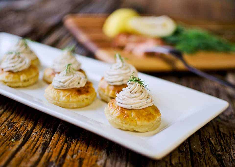 Smoked salmon puffs filled with creamy goat cheese.