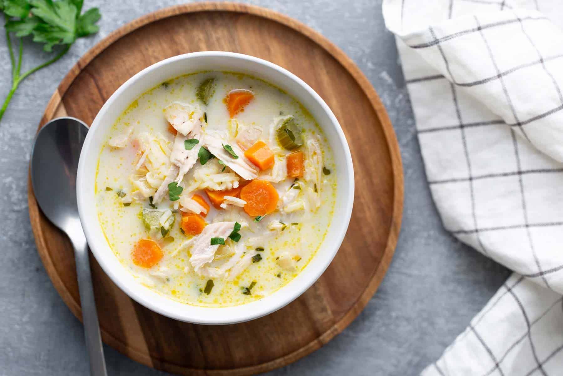 Clear turkey broth soup with tender shredded turkey and rice.