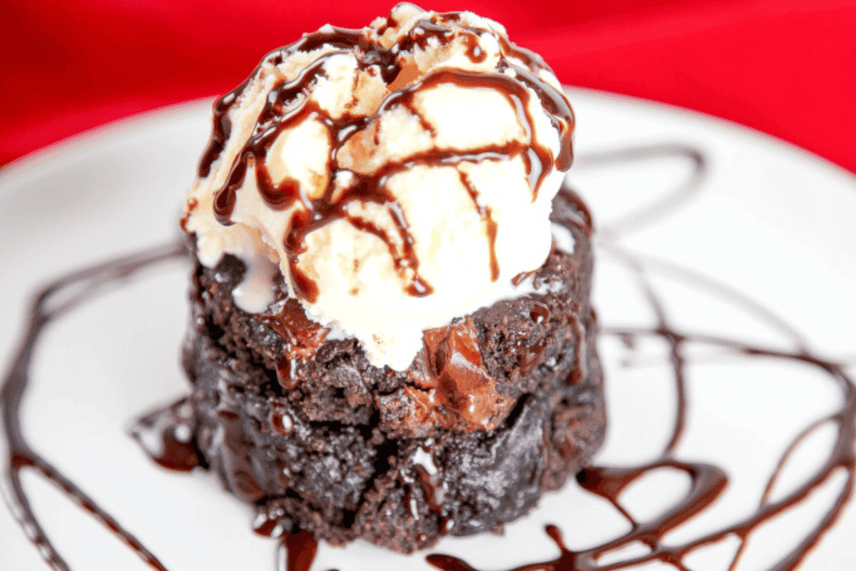 Microwave mug brownie topped with chocolate chips.