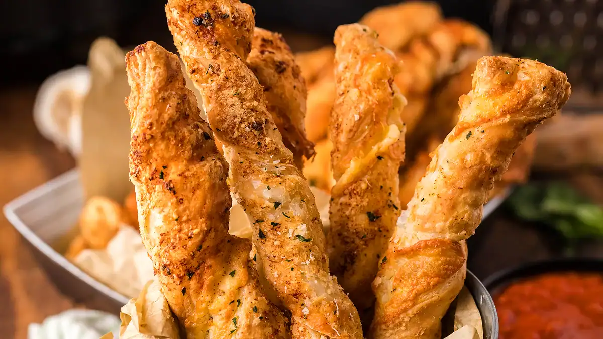 Buttery puff pastry twists filled with garlic and cheese, air-fried to a golden crunch.