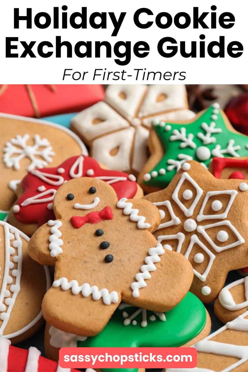 Assorted Christmas cookies including a smiling gingerbread man, snowflakes.